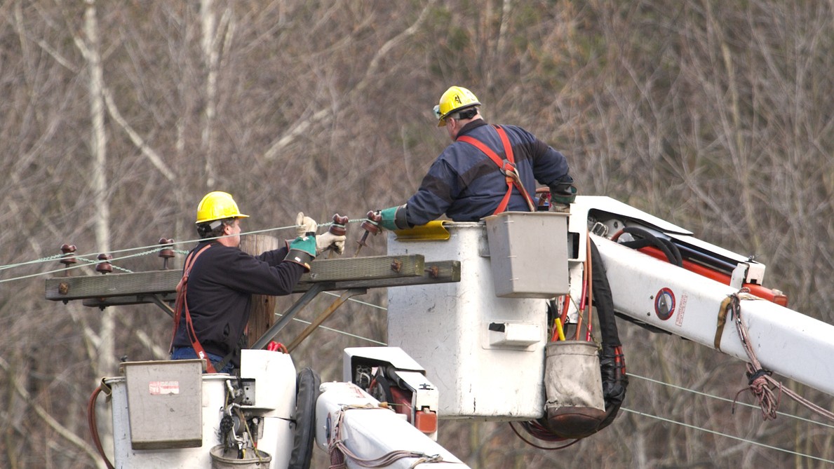 Play the product tour: utility line crews working overhead lines from bucket trucks